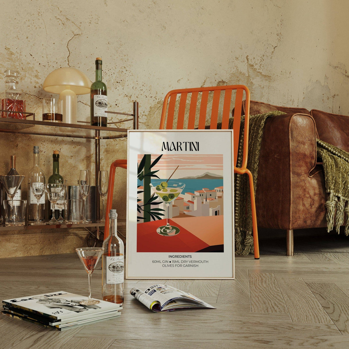 Martini Poster print leaning on the floor with a glass of cocktail and books in a living room