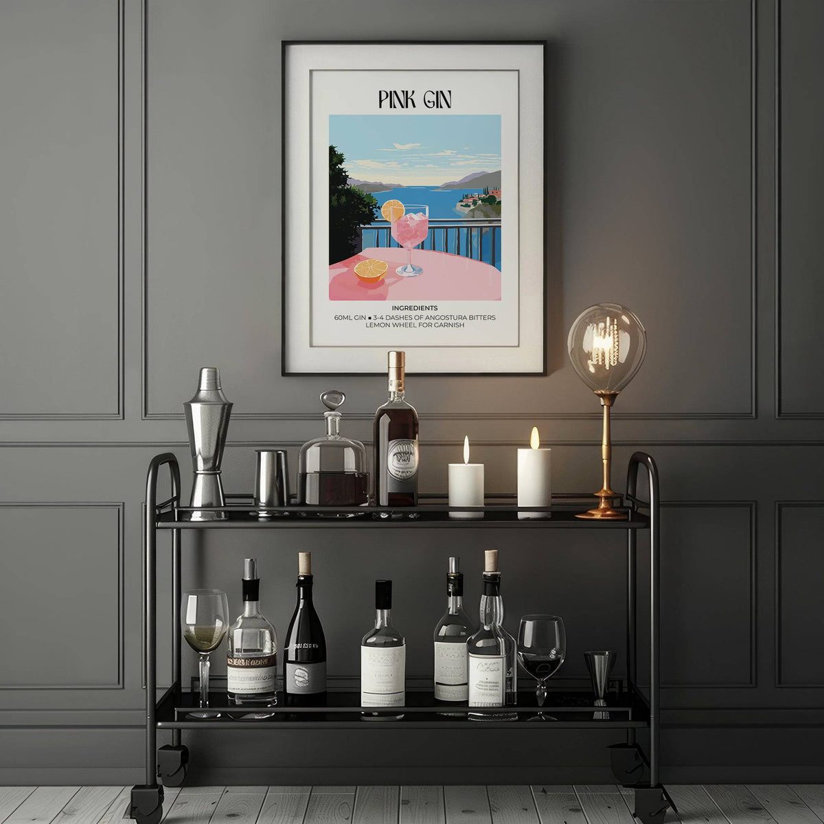 Print on a wall in a dark room of Bar Cart Art showing a pink gin cocktail with blue sky above a black bar cart with bottles and a lamp