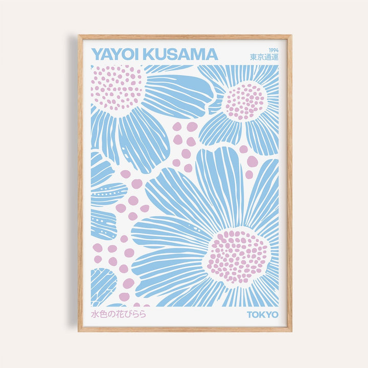 Framed print close-up of light blue wall art with blue and pink floral illustration and text