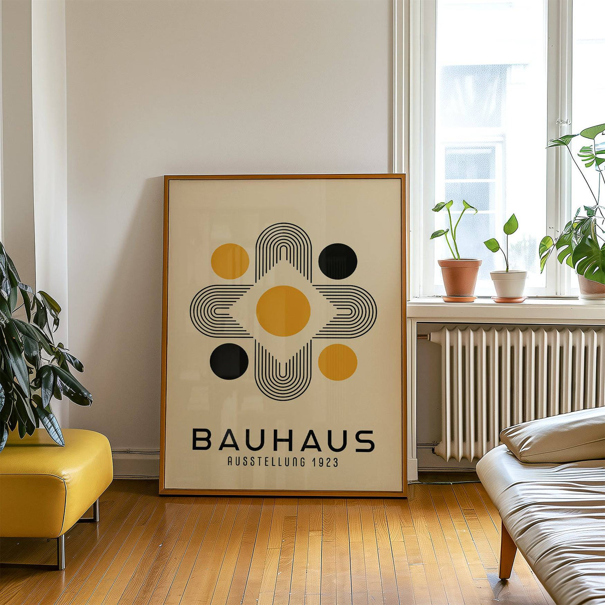 Geometric Abstract Wall Art leaning against a wall with orange and black shapes in a living room with plants