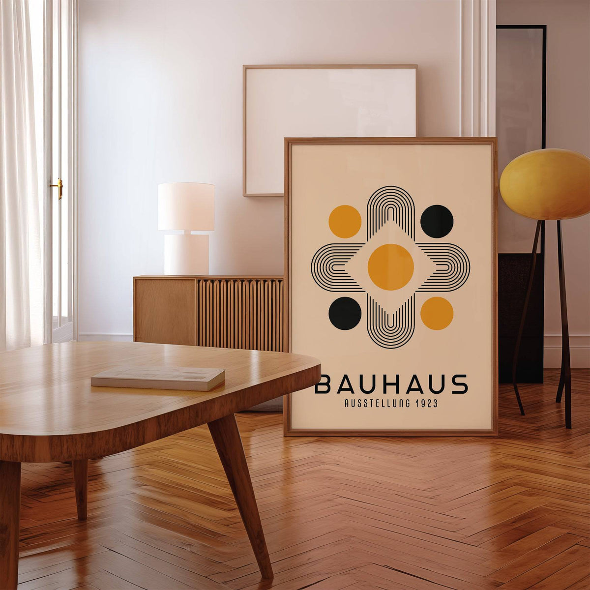 Geometric Abstract wall art leaning on floor with a wooden frame and retro furniture nearby
