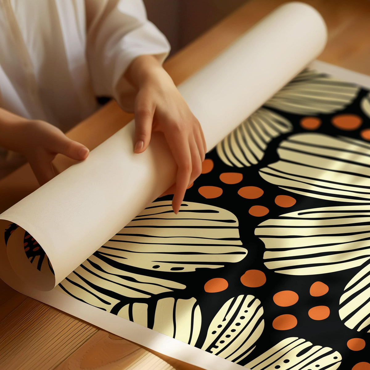 Detail close-up of modern floral art print with large daisies in cream and orange on black