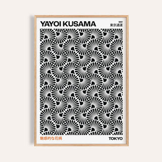 Framed Hypnotic wall art with black and white abstract pattern in a light wooden frame