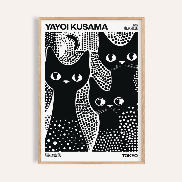 Framed close-up of Black Cats Poster showing three black cats with white spots in minimalist style