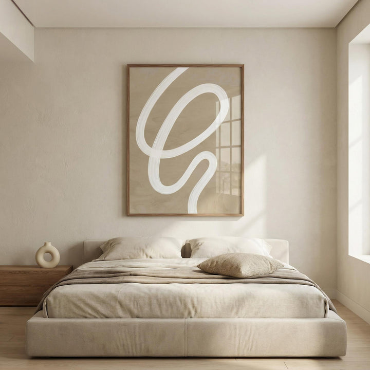 Abstract painting minimalist above a beige bed with neutral bedding and a circular vase on a wooden bedside table