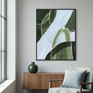 Green and Blue Art abstract stream with green and blue curves above a wooden sideboard in a room