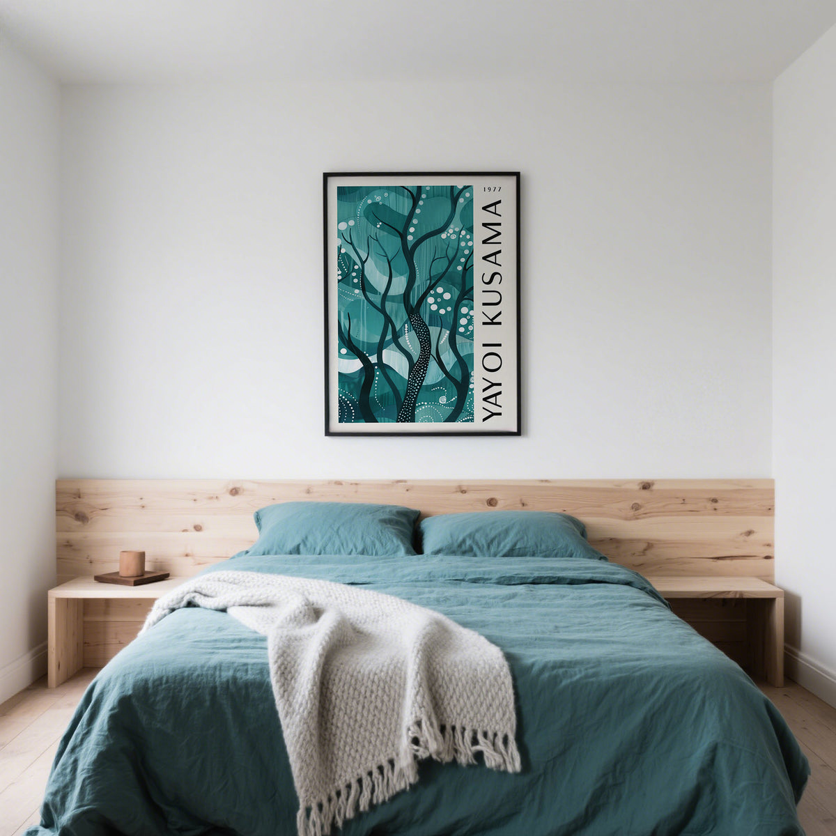 Green Nature Poster above a bed with teal bedding and a wooden headboard in a minimalist bedroom
