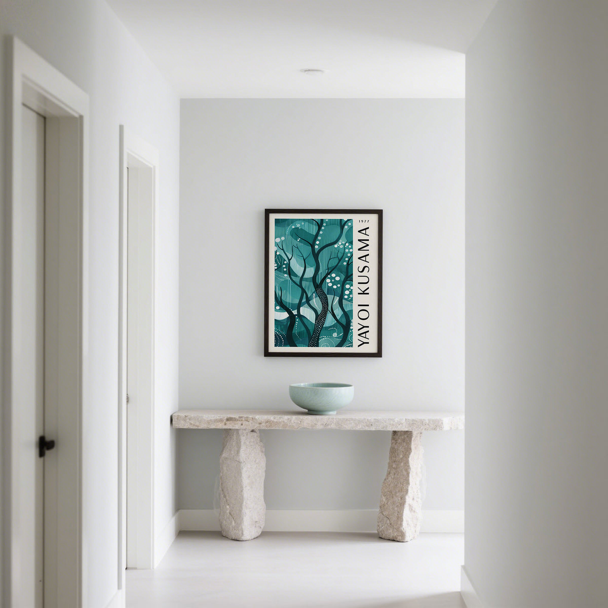 Green Nature Poster hanging in a hallway above a stone console table with a bowl