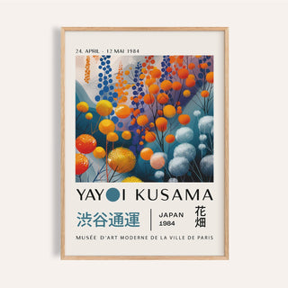 Abstract Floral wall art with round orange and blue pom-pom flowers in a wood frame