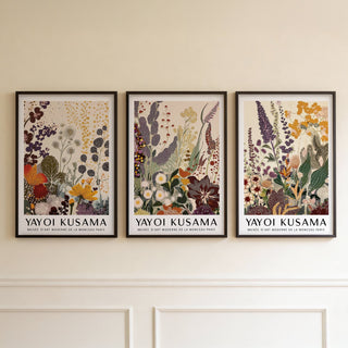 Framed Botanical Gallery Wall Set of botanical floral prints with muted purple orange and green tones