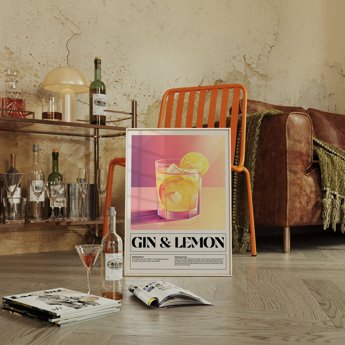 Bar wall decor of a gin and lemon cocktail illustration next to a brown sofa and orange chair in a rustic room