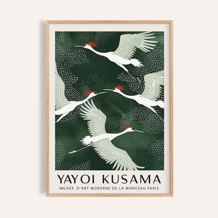Japandi wall art of red-crowned cranes flying against a dark green abstract background