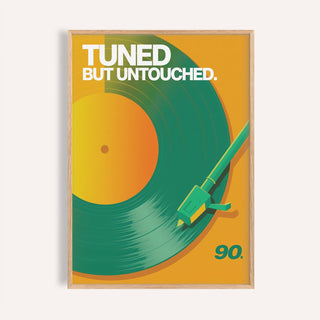 Framed Vinyl Record Art Print showing a green vinyl on an orange background with white text