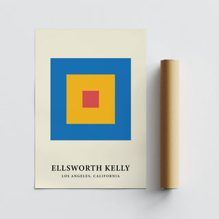 Minimalist art print of concentric red yellow and blue blocks next to a brown packaging tube