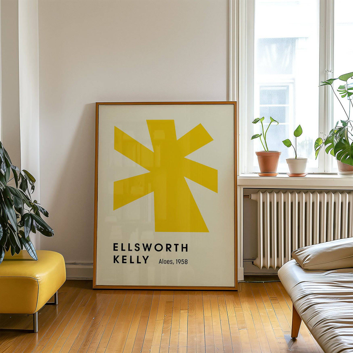Large Minimalist Wall Art leaning on the floor with a yellow abstract shape and text in a bright room with plants