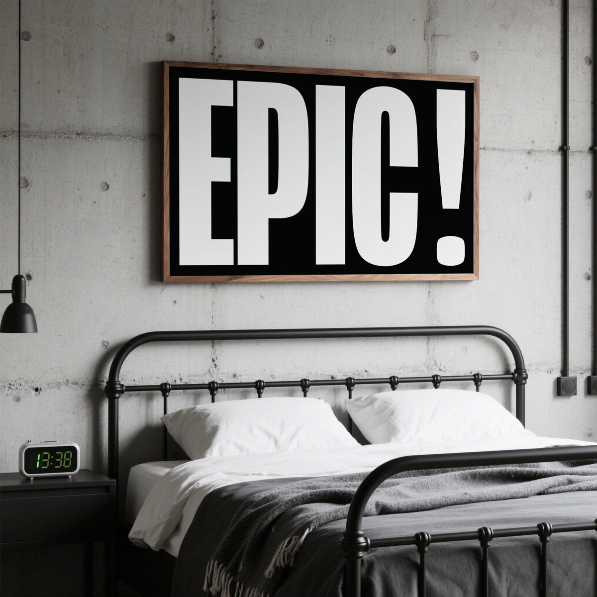 Posters Bold Font wall art with large white letters on black above a metal bed in a bedroom