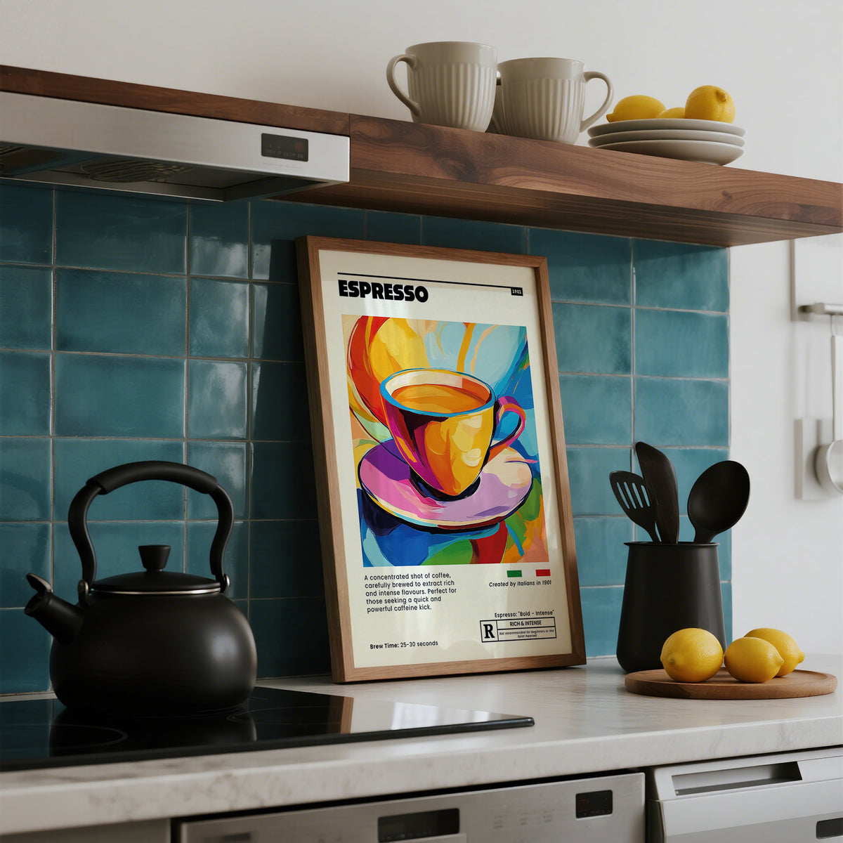 Colorful coffee-themed espresso poster on a kitchen counter with a black teapot and lemons.