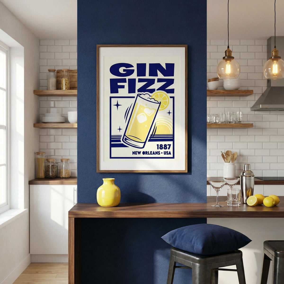 Vintage Gin Fizz print on a blue wall above a wooden kitchen counter with a yellow vase