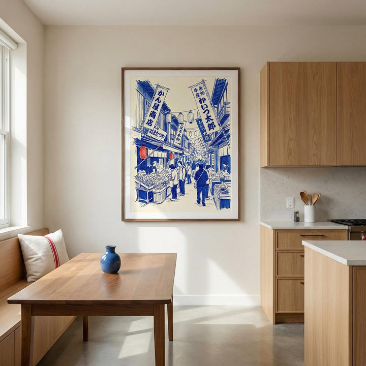 Japanese Market Art Print on a kitchen wall showing a blue and cream line-art illustration with people and market stalls