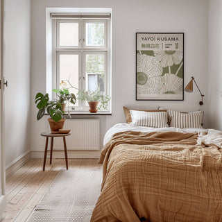 Sage Green Wall Art framed print close-up showing minimalist poppy flowers in sage green above bed with brown bedding