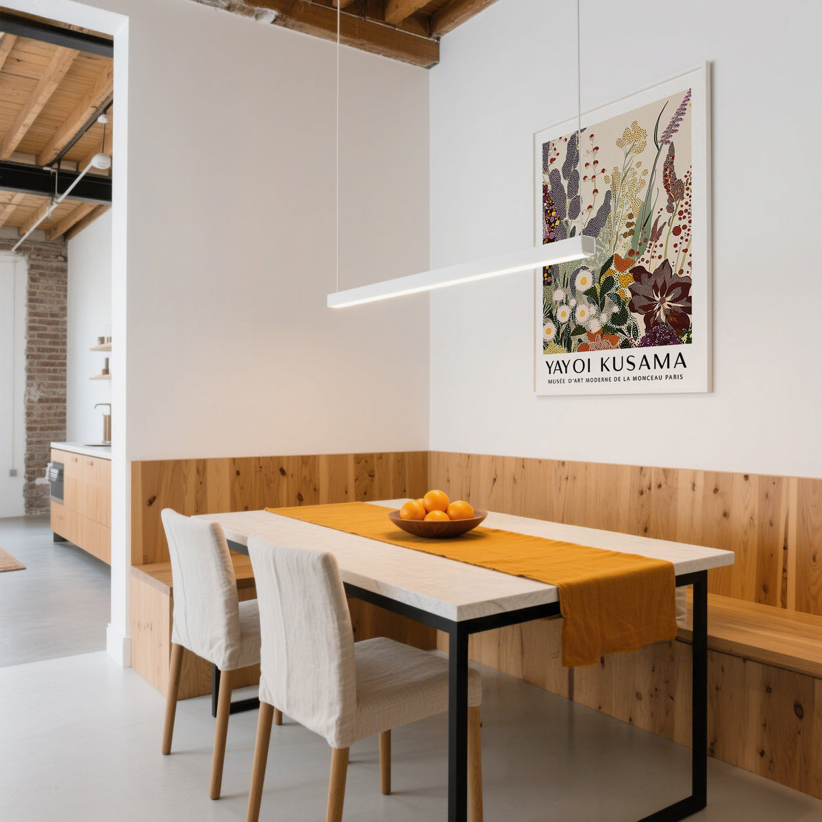 Abstract Floral Print in a dining area with wooden wall panelling and a bowl of oranges on the table