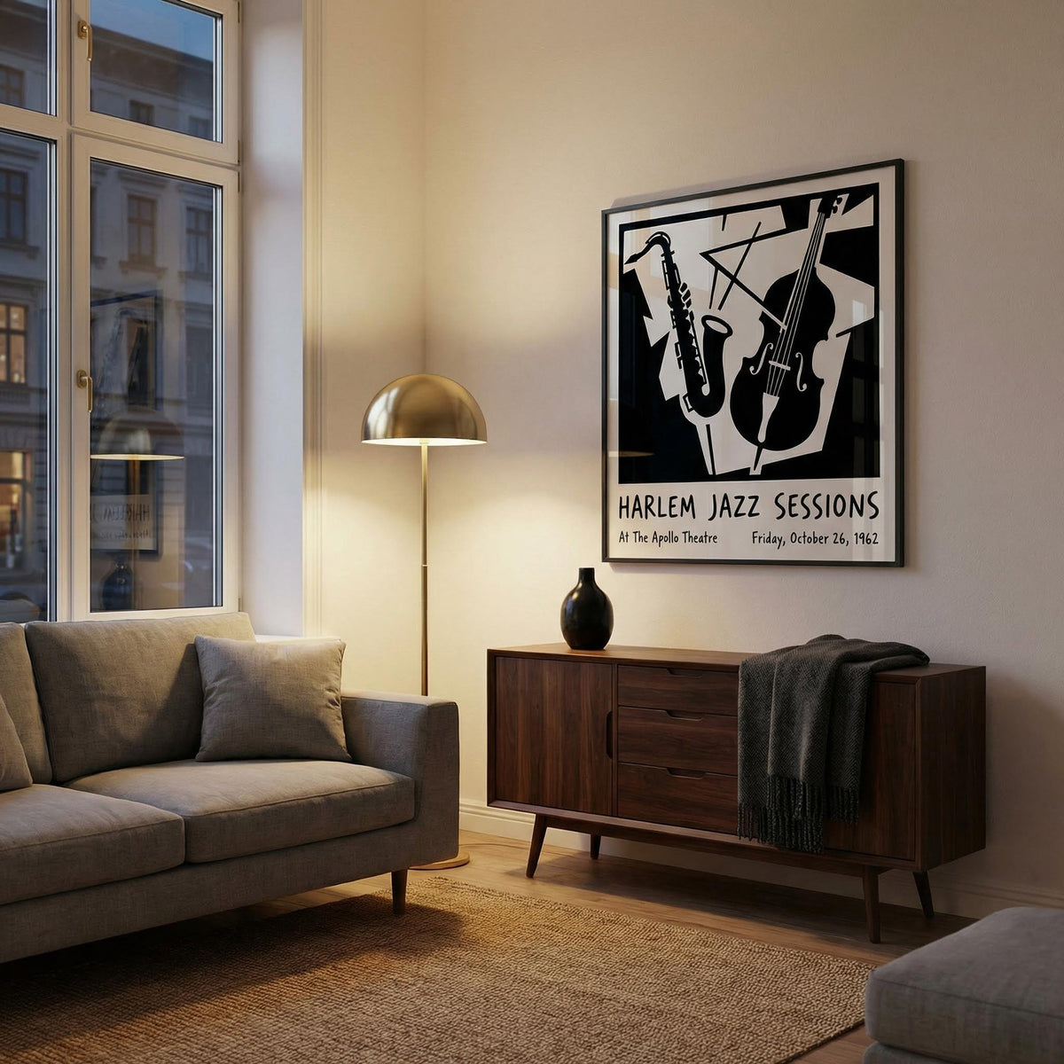 Music poster wall art in black and white above a wooden sideboard with a small vase