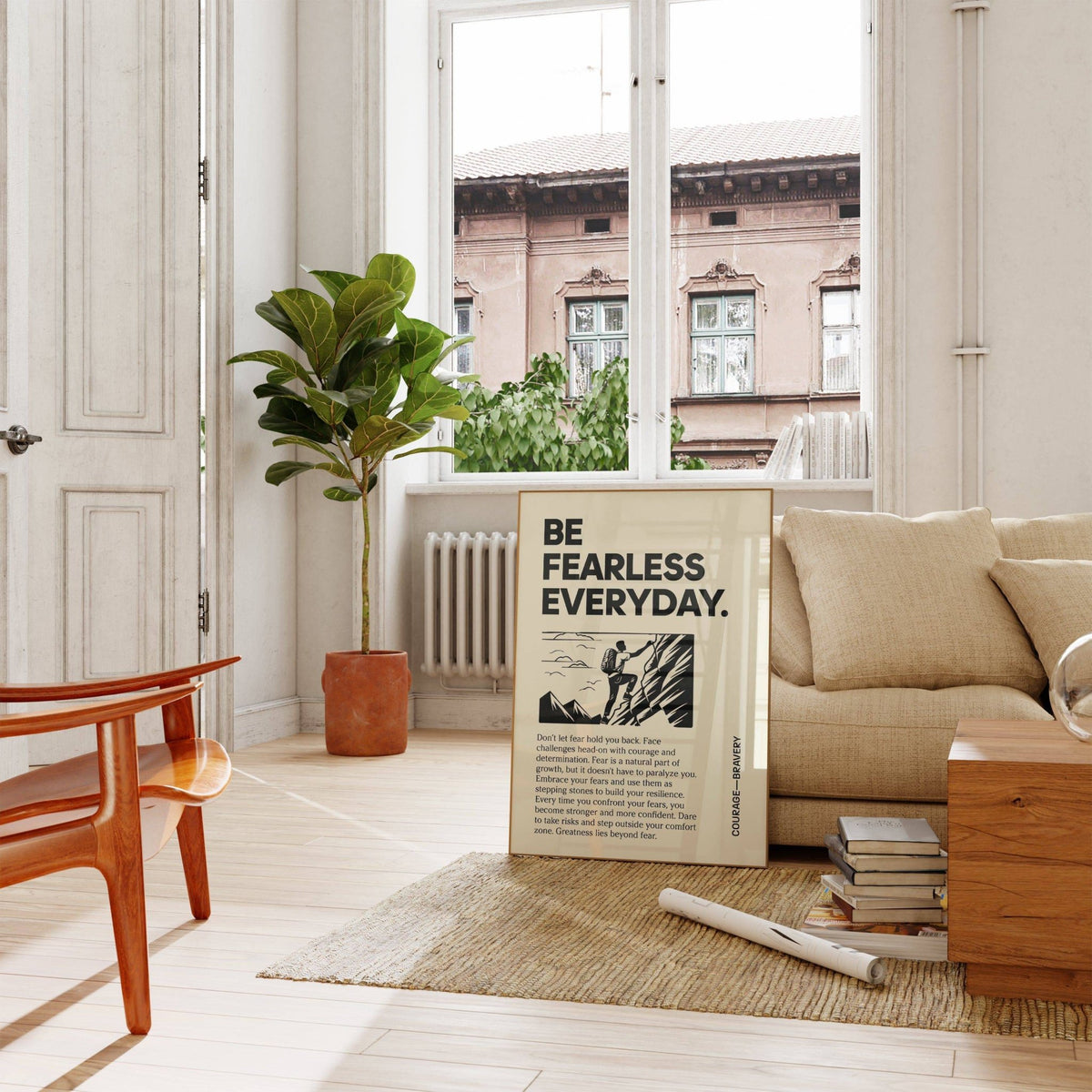 Print leaning on a floor near a beige sofa of a black and cream minimalist rock climber Positive Poster Art