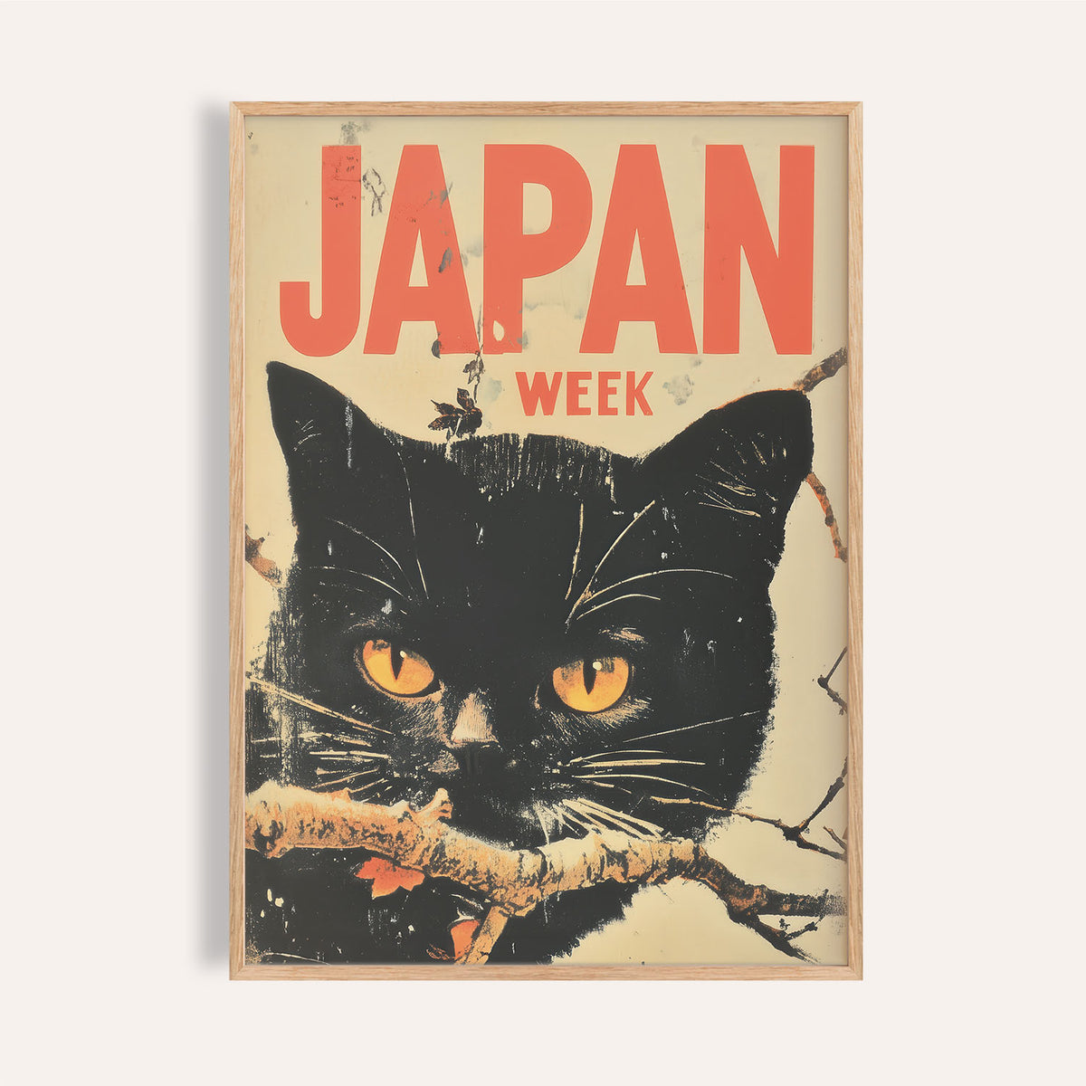 Framed print close-up of Retro Japanese Art with a black cat face and orange text