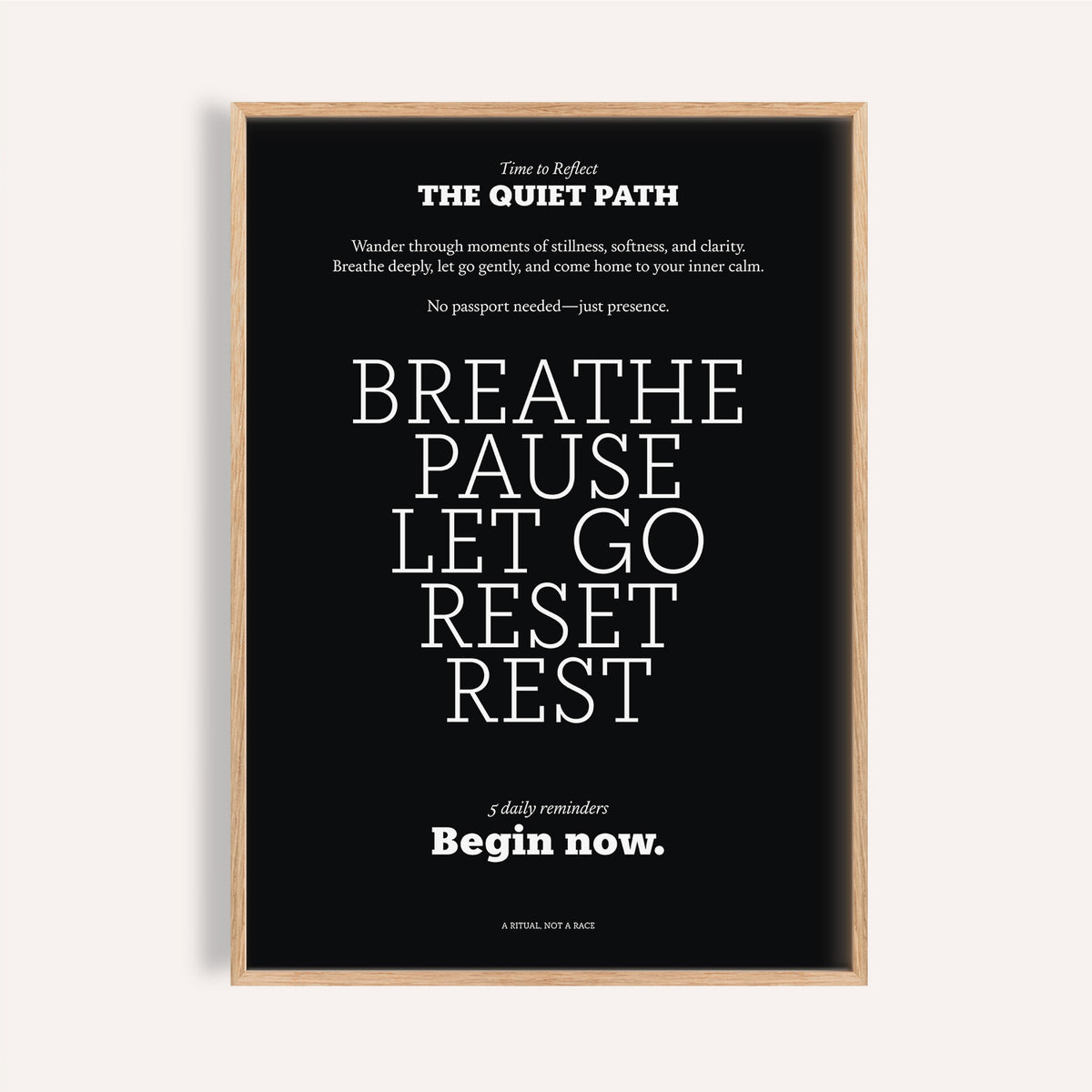 Meditation wall art with white motivational text on a black background in a light wood frame