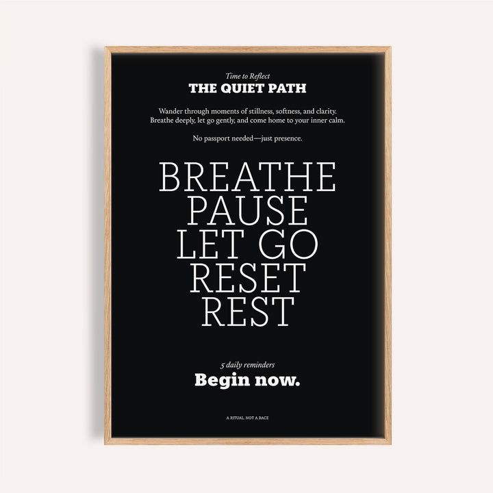 Meditation wall art with white motivational text on a black background in a light wood frame