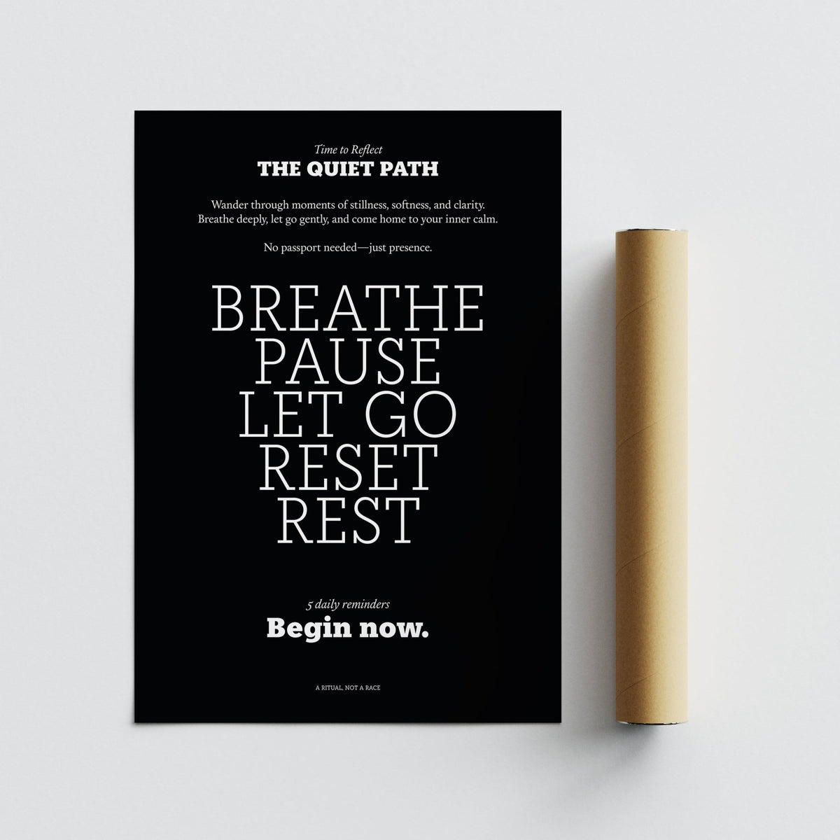 Meditation wall art with motivational text in white on a black background shown next to a brown packaging tube