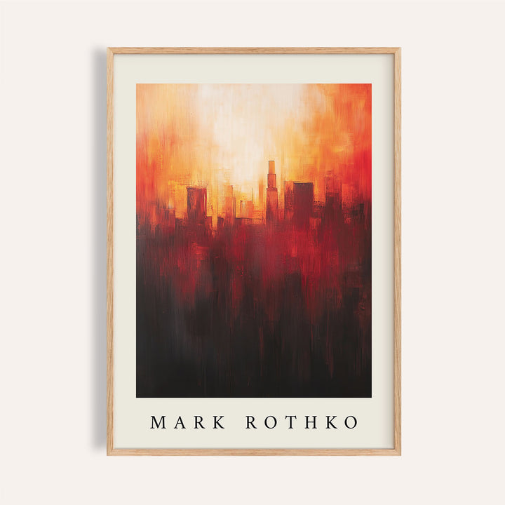 Framed California wall art showing an abstract city skyline in fiery red and orange hues with a light centre
