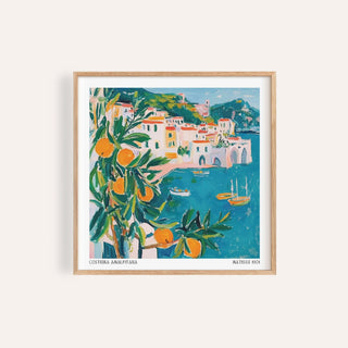 Framed Amalfi Coast print of an orange tree branch with bright fruit and coastal buildings