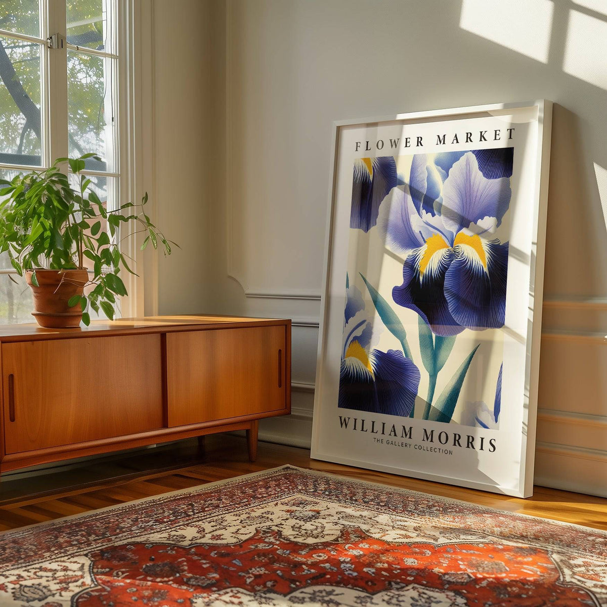 Purple flower wall art leaning on the floor with a wooden sideboard and green plant nearby