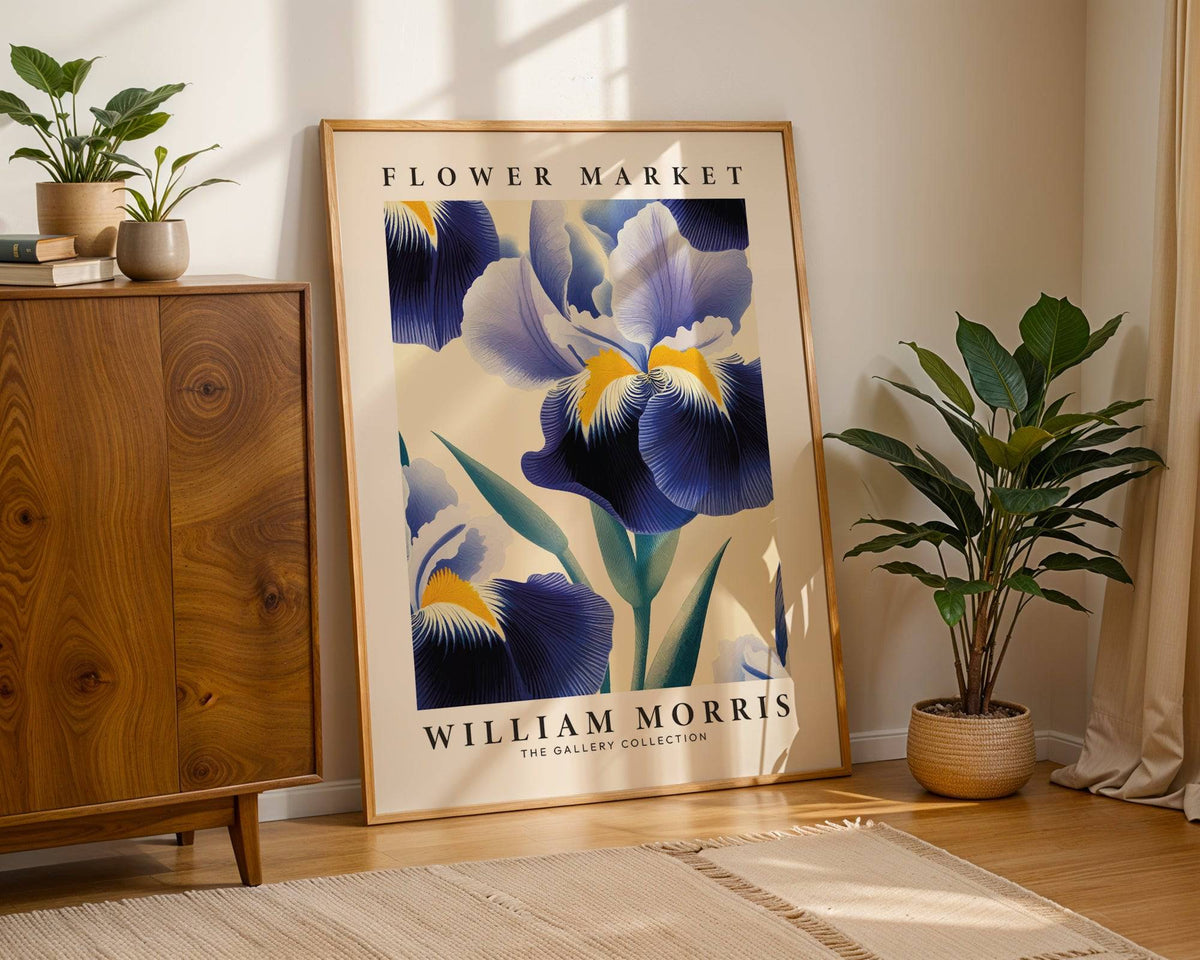 Purple Flower wall art leaning on the floor beside a large potted plant in natural light