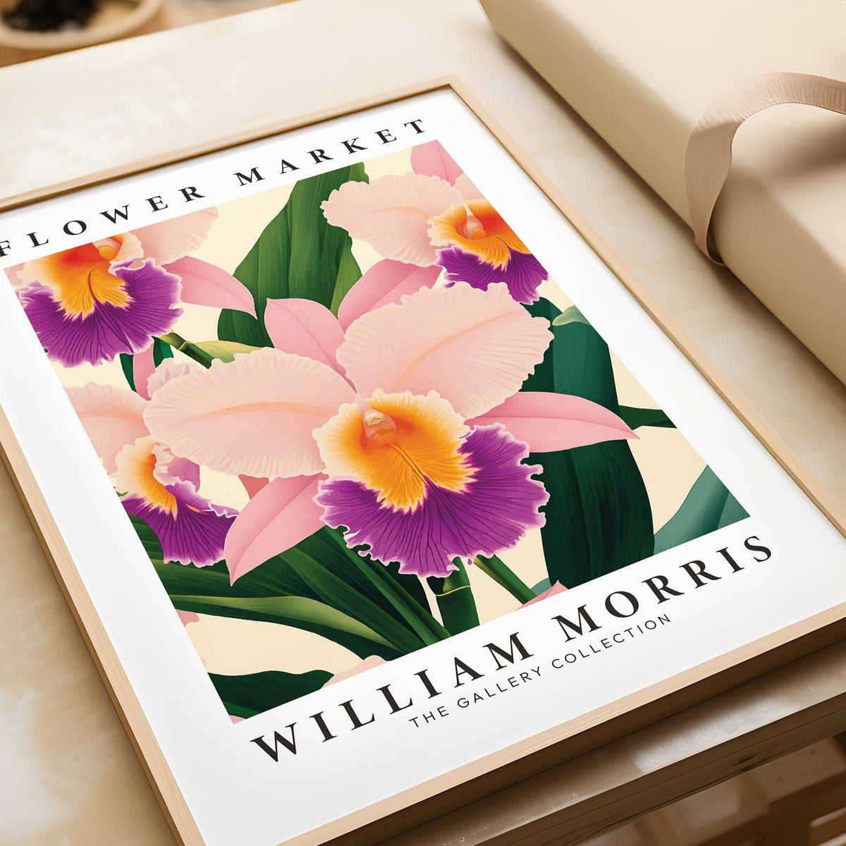 Framed Wall Art Orchids showing pink and purple orchid flowers on a table with gift wrap