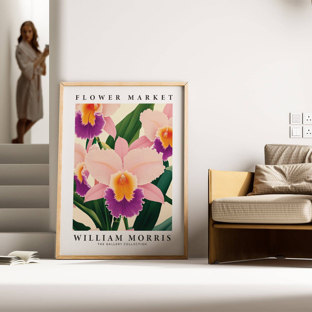 Wall Art Orchids print featuring pink and purple orchid flowers leaning against a chair in a light room