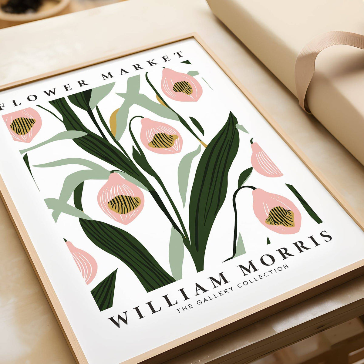 Paintings of Orchids framed print close-up showing pink orchid flowers with green leaves on a table