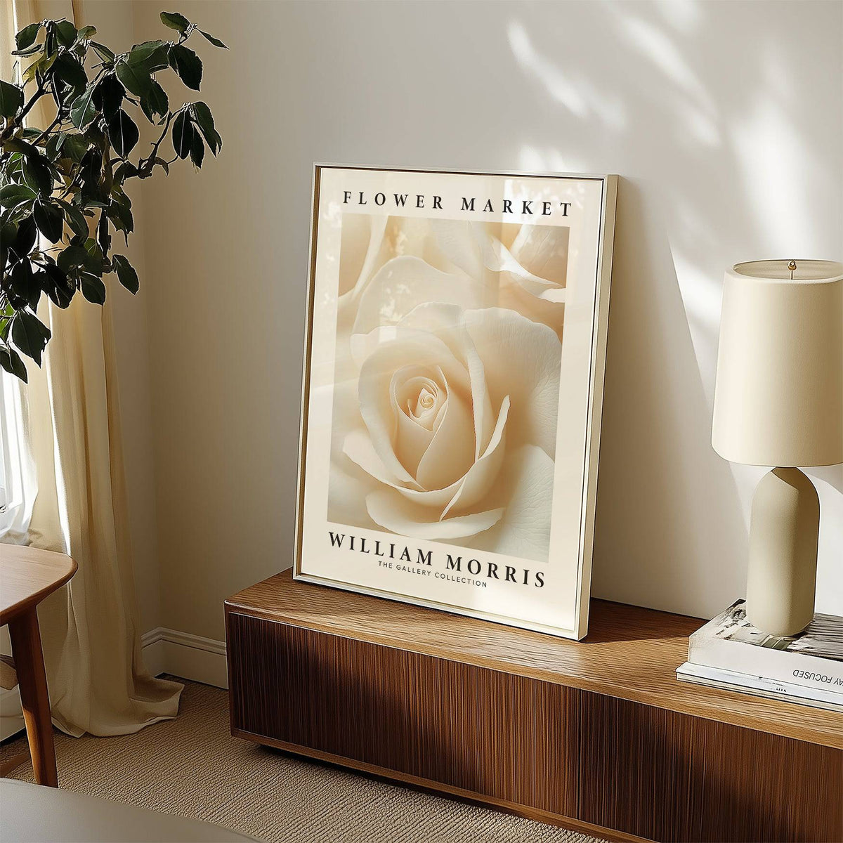 Framed Floral Wall Art for Living Room leaning on cabinet with lamp beside