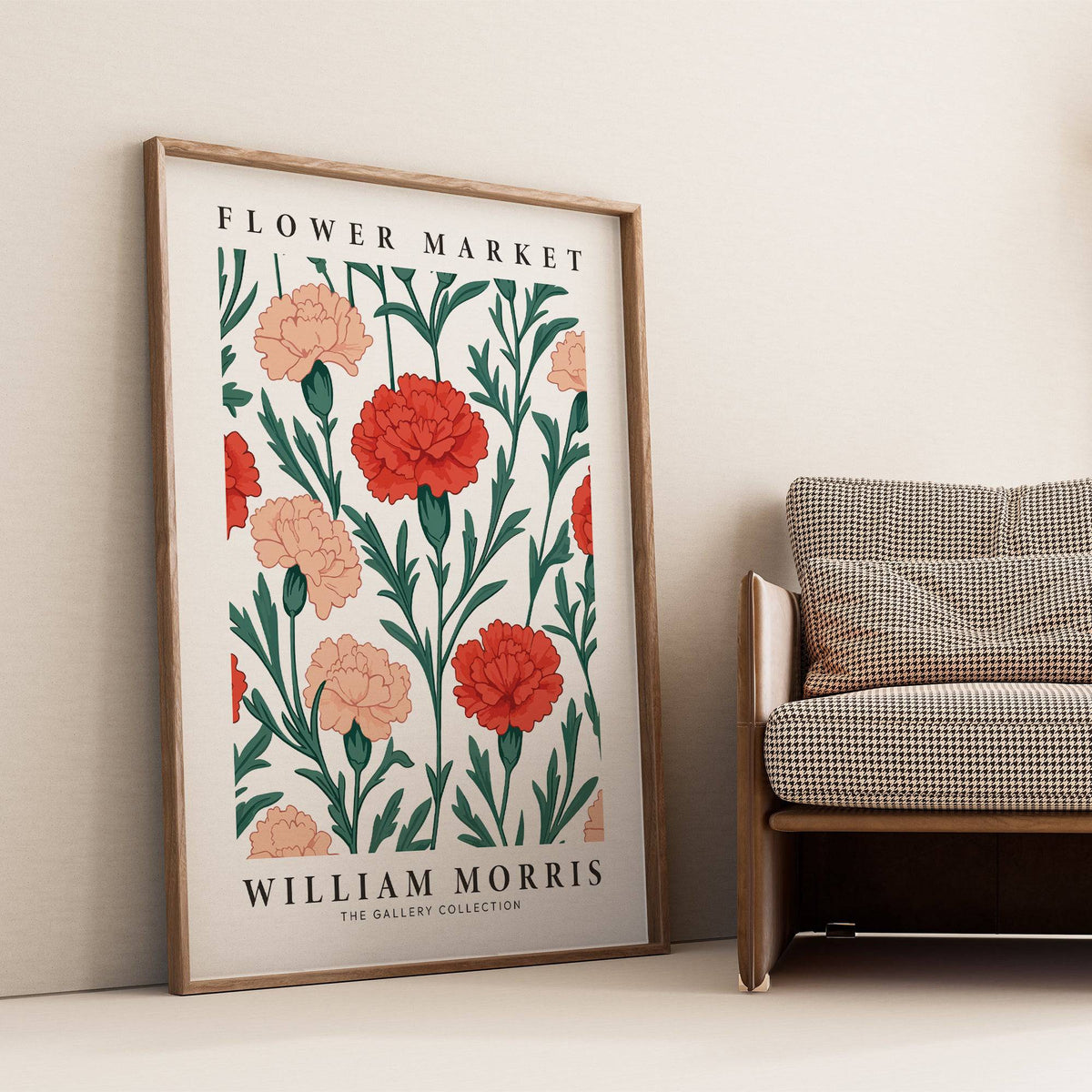 Pictures for Living Room print leaning beside a checkered armchair with red and peach carnations