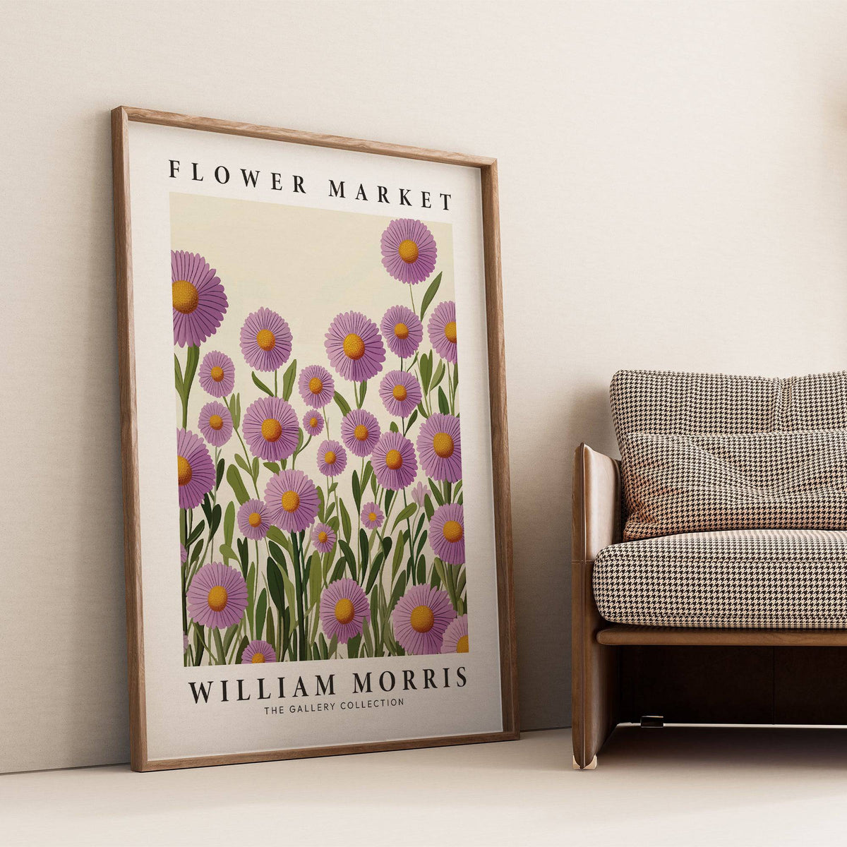 Purple Floral Wall Art leaning against a wall with purple daisies and green stems next to a patterned armchair