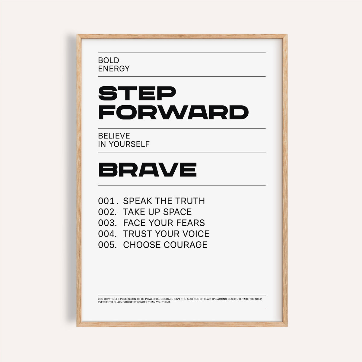 Framed Inspirational Quotes Artwork with black motivational text on white background under natural light