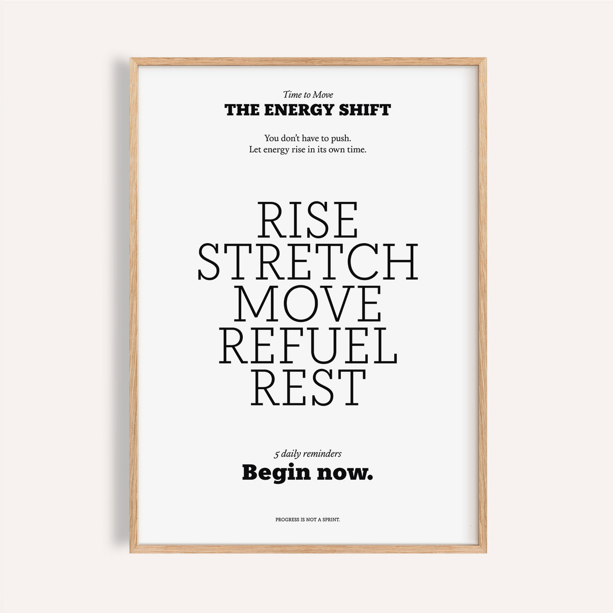Framed print with an inspirational saying in black typography on a white background