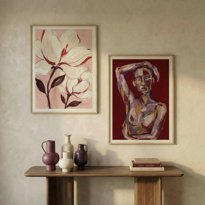 Abstract Figure and Floral Wall Art Set showing an abstract female figure with red background and a white flower print above a wooden