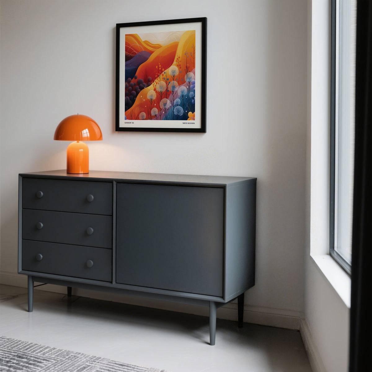 Art Print Square framed print close-up of a colourful mountain landscape with dandelions above a grey sideboard with an orange lamp