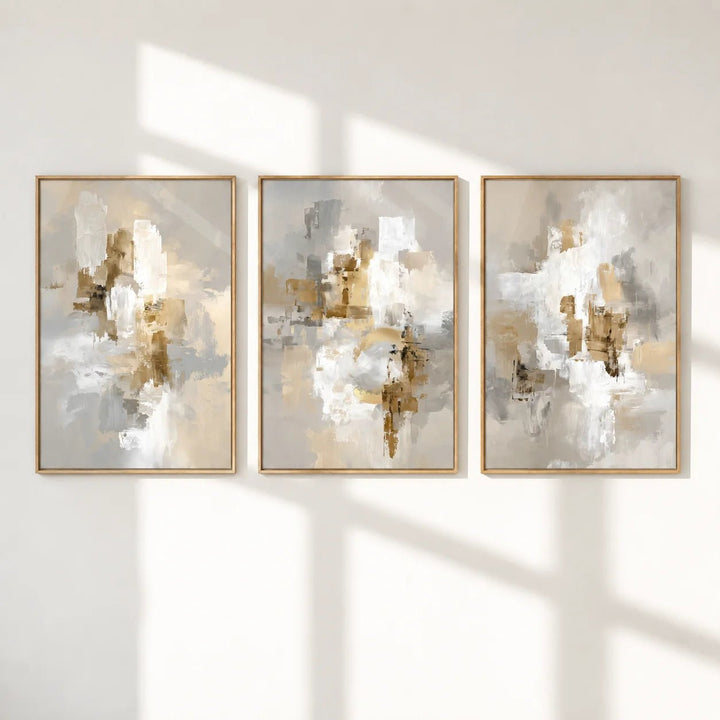 Neutral dining room wall art of three frames with neutral abstract shapes in beige grey and white