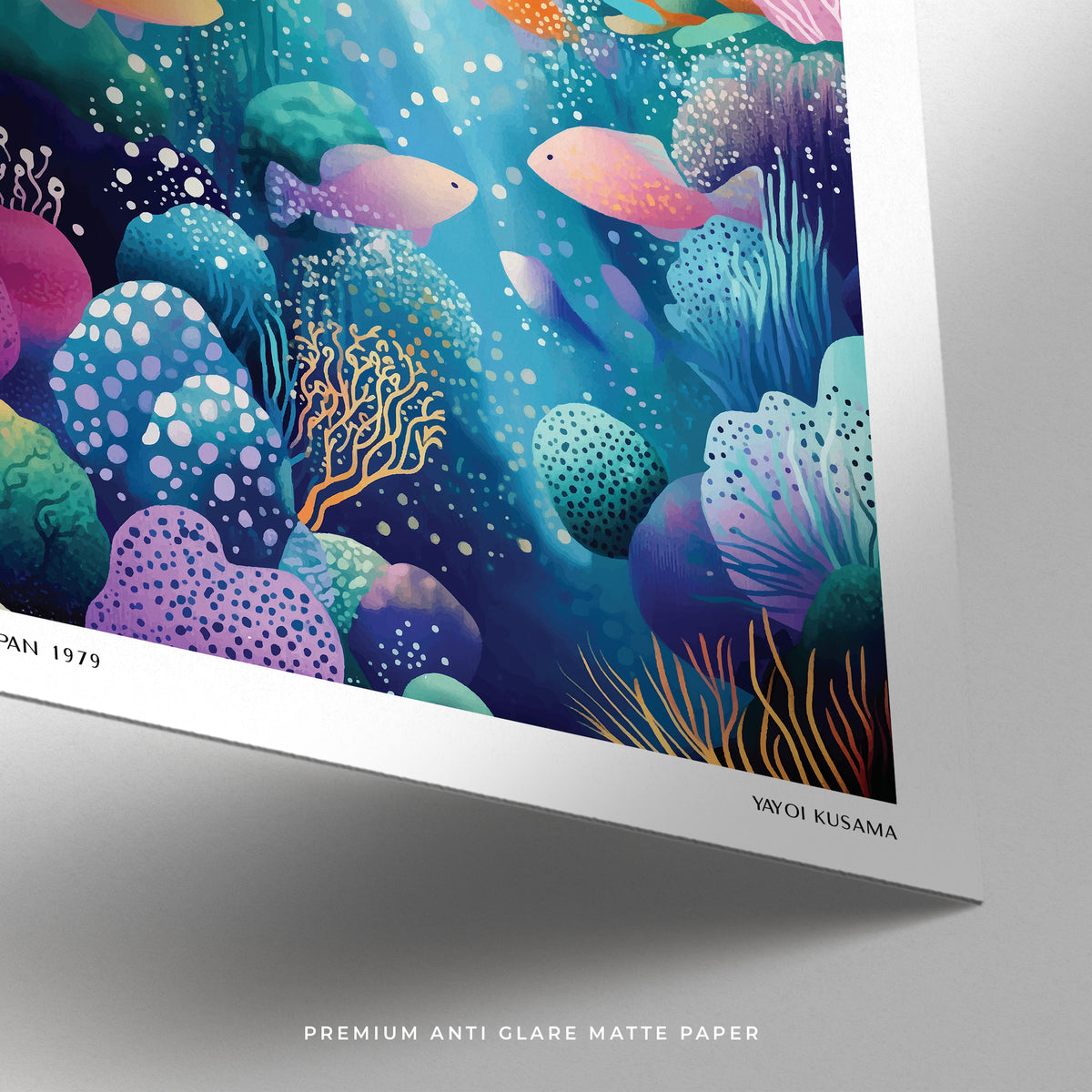 Close-up of coral reef wall art showing colourful fish and detailed underwater plants on matte paper
