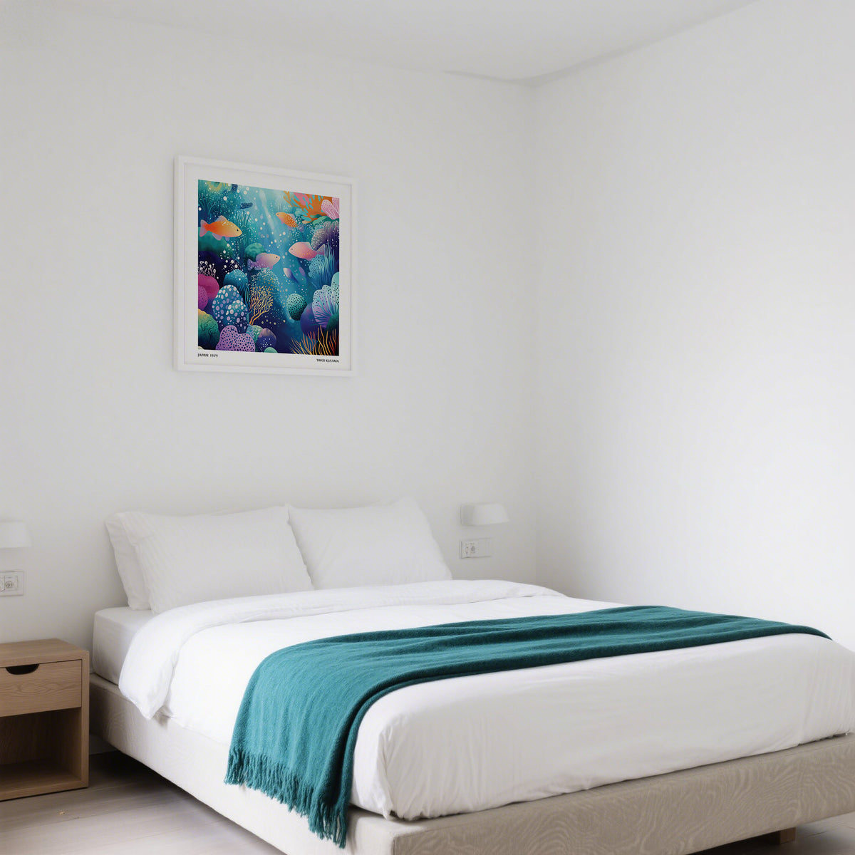 Coral Reef wall art of colourful fish underwater in a white frame above a bed in a white bedroom