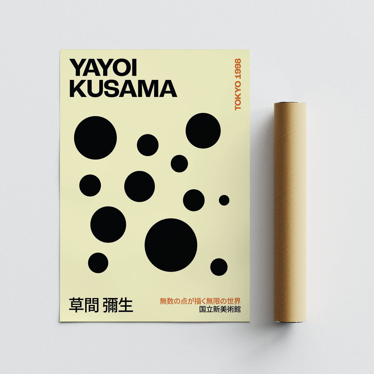 Polka Dot Artwork with black dots on cream background beside a brown packaging tube