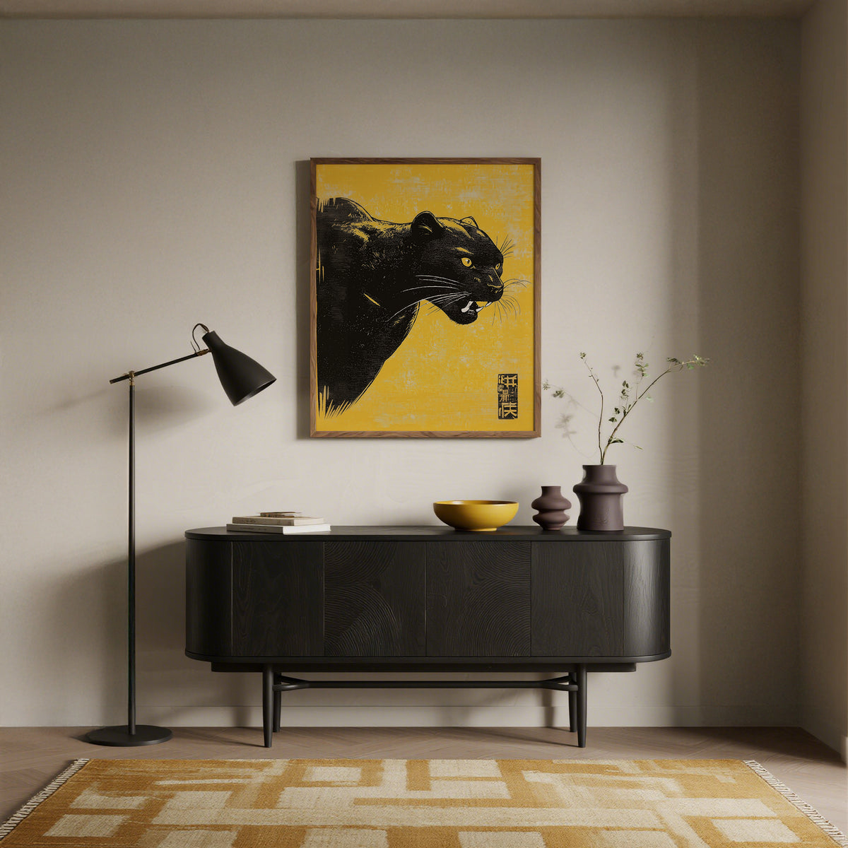 Panther wall art with a black panther head on yellow background above a black sideboard with vases and lamp